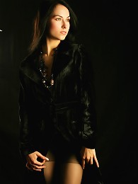 Sultry babe with lustrious black hair and hypnotic eyes.